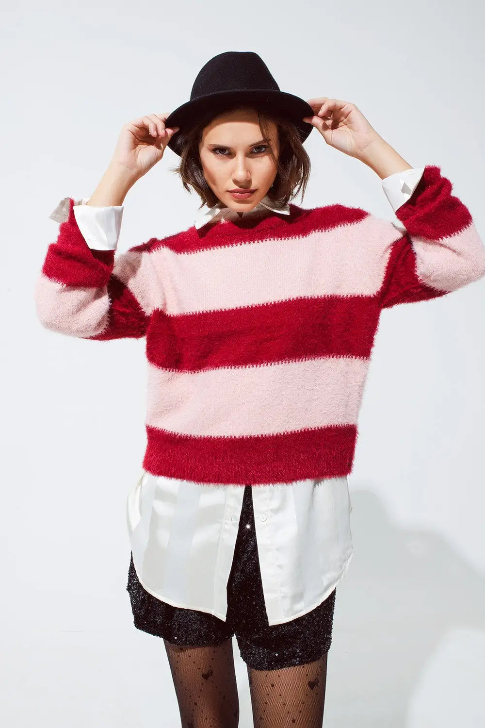 Q2 Pink sweater with stripes and a crew neck