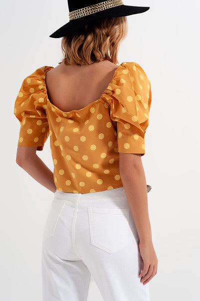 Polka dot top with puffed sleeves and square neckline in yellow