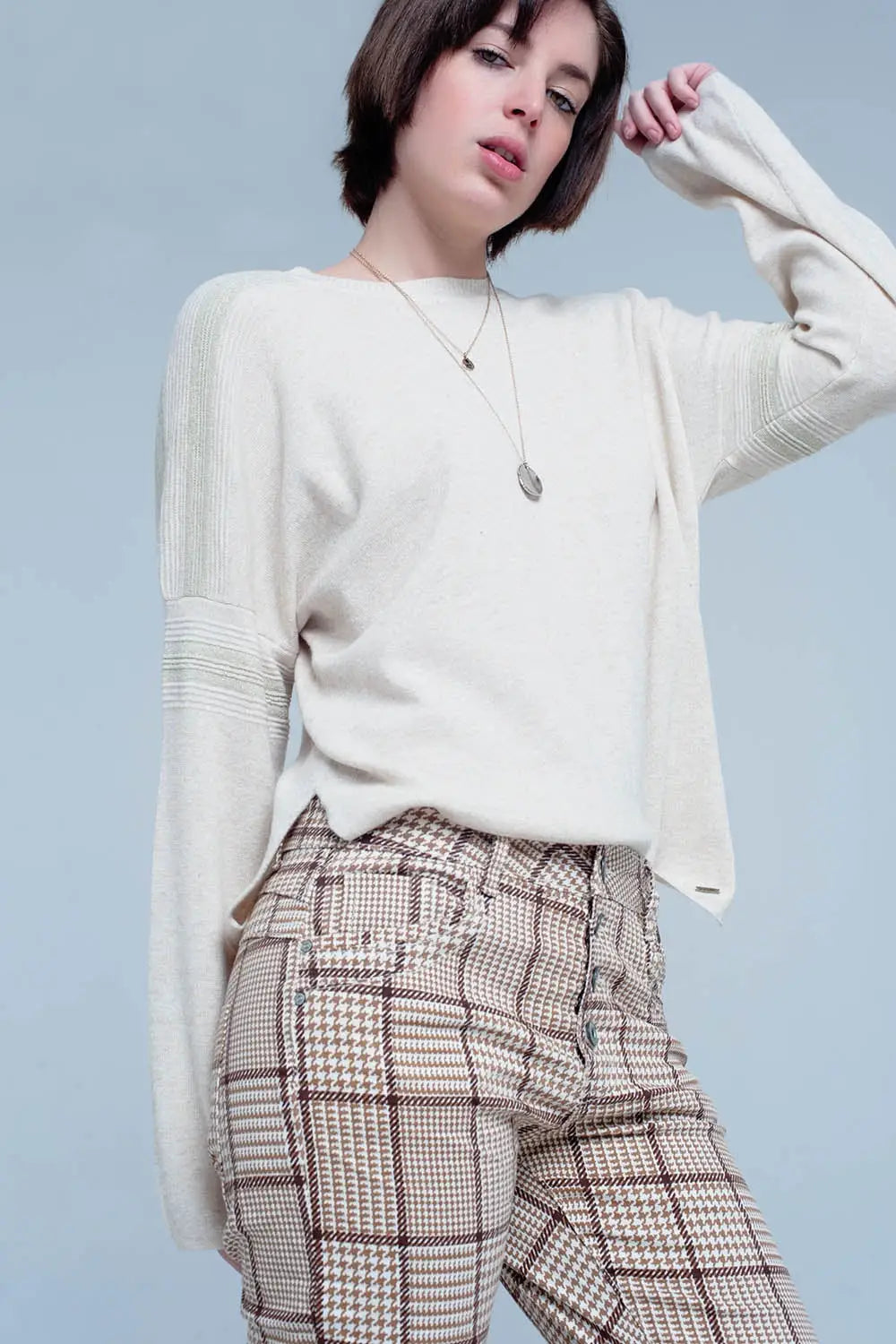 Pull fin tricoté beige avec détails du scintillement - Pulls