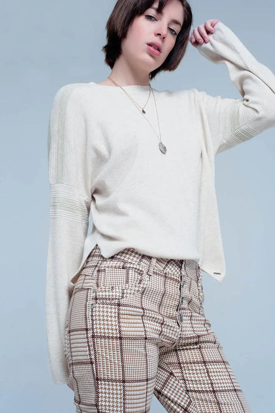 Pull fin tricoté beige avec détails du scintillement - Pulls