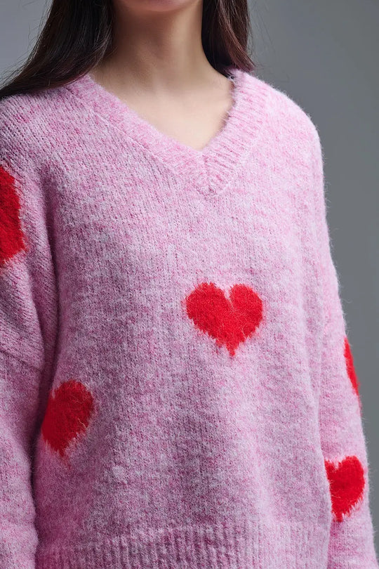 Pull rose à col en V et à manches longues avec cœurs rouges - One Size / rose - Pulls