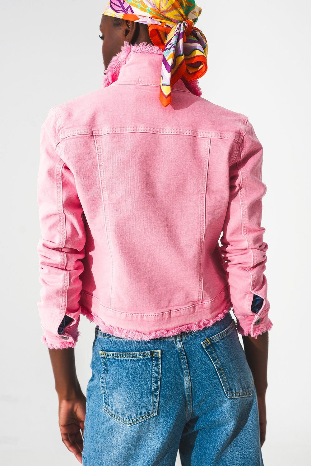 Raw edge denim jacket in pink