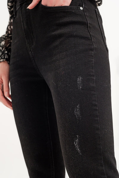 Raw hem skinny jeans in washed black