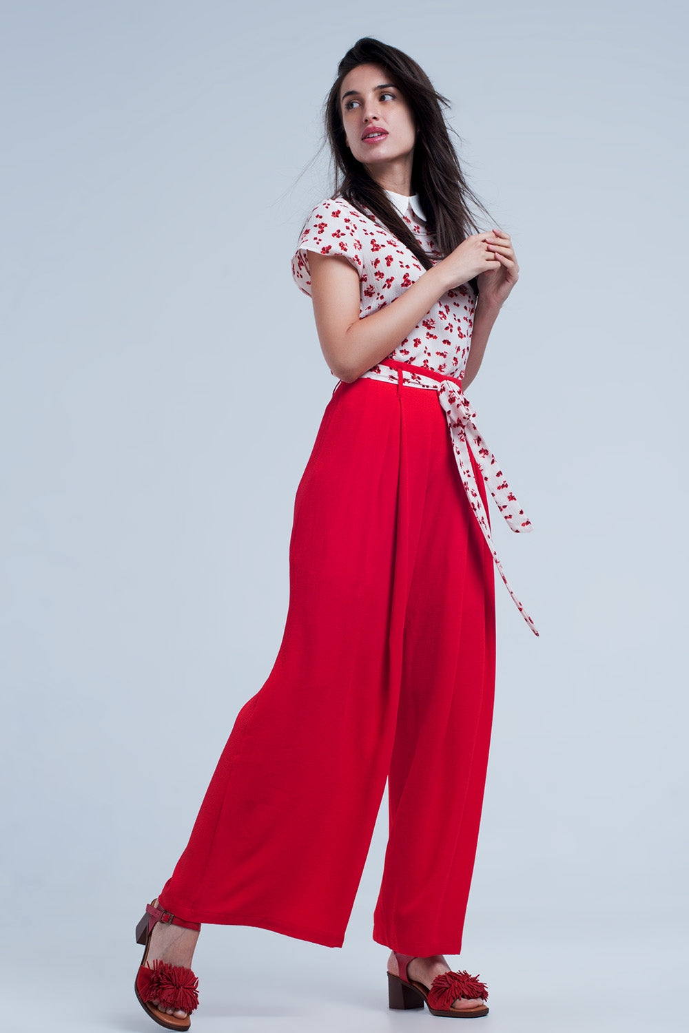 Red pants with floral belt