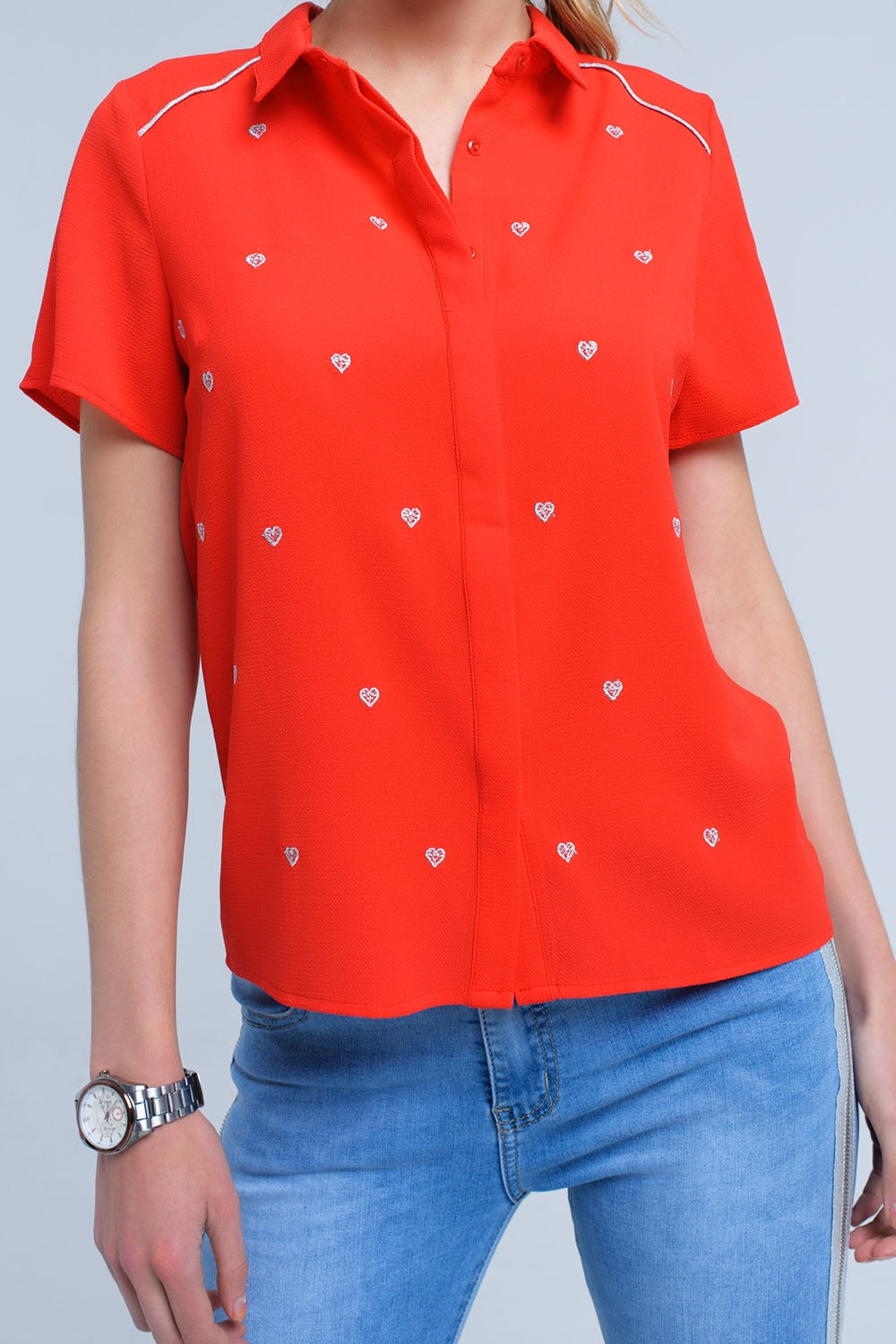 Red shirt with heart embroidery