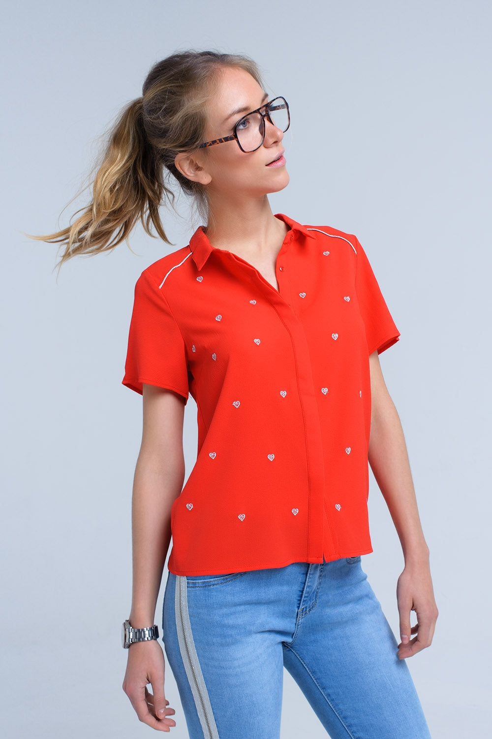 Red shirt with heart embroidery