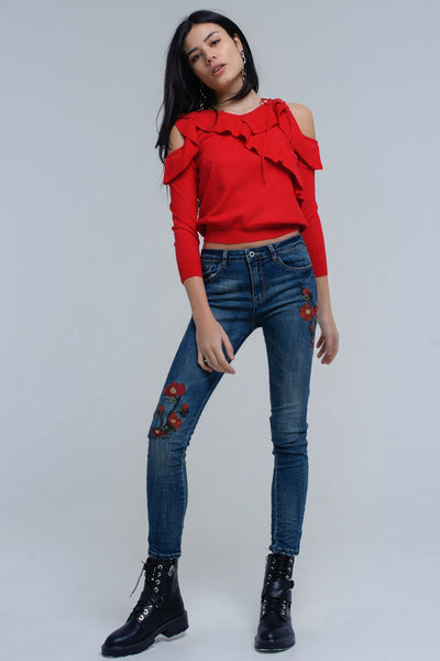 Red sweater with ruffle detail at front