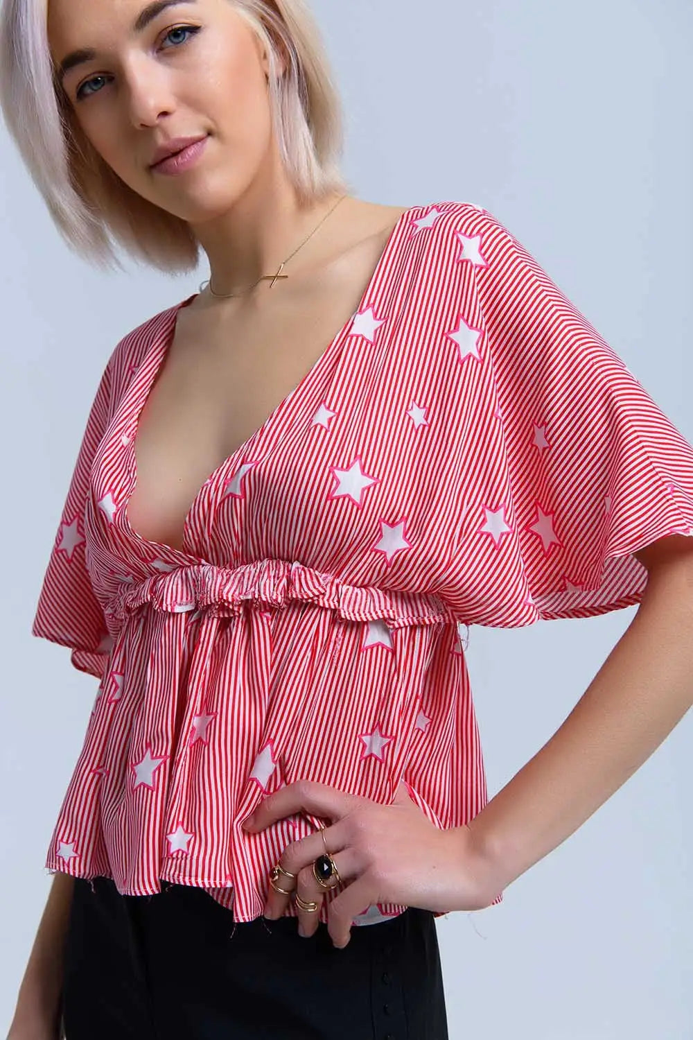 Q2 Red top with stars and ruffle