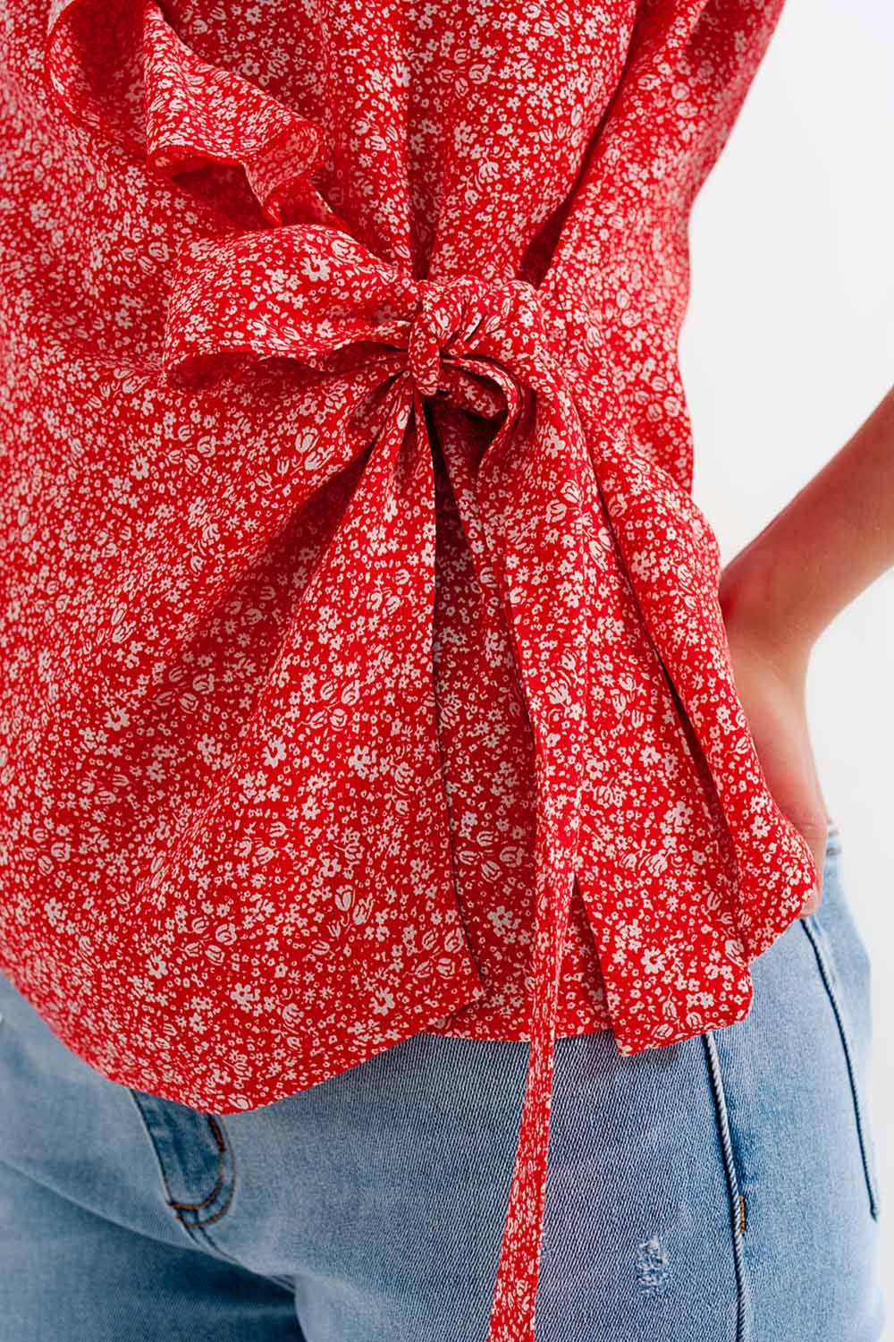 Red wrap top in clustered flower print