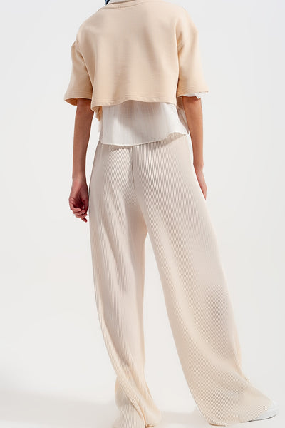 Relaxed wide leg trousers in plisse cream