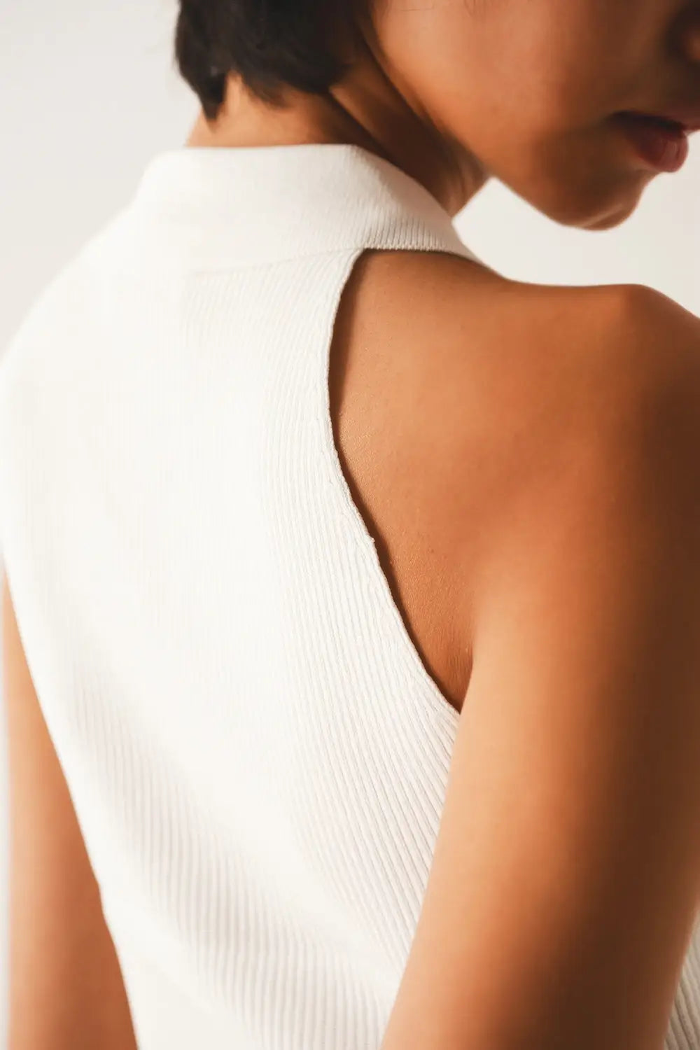 Ribbed knitted top with polo neck in cream - Sweaters