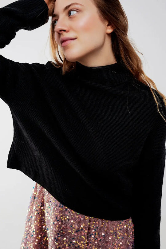 Ribbed roll neck jumper in black - Sweaters