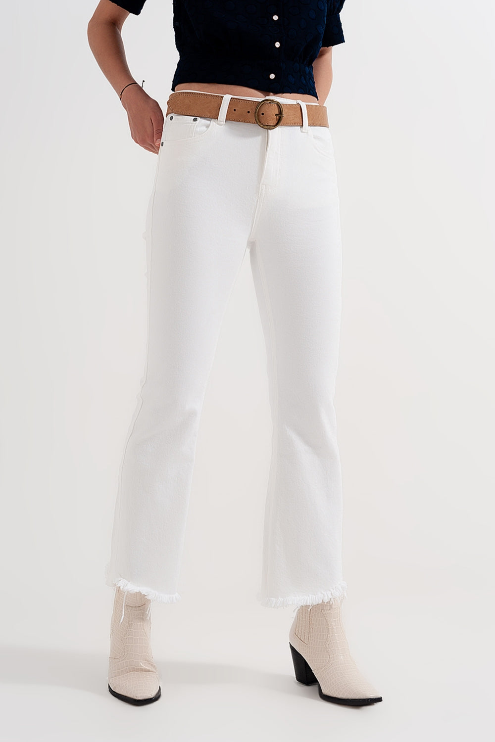 Rigid cropped flare jeans in cream with raw hem