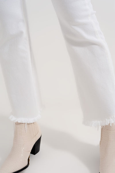 Rigid cropped flare jeans in cream with raw hem