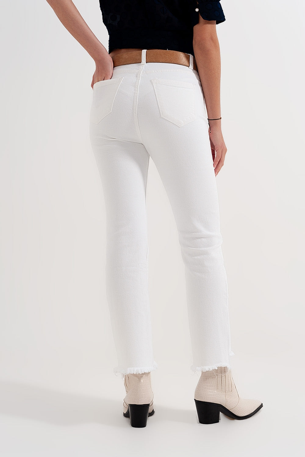 Rigid cropped flare jeans in cream with raw hem