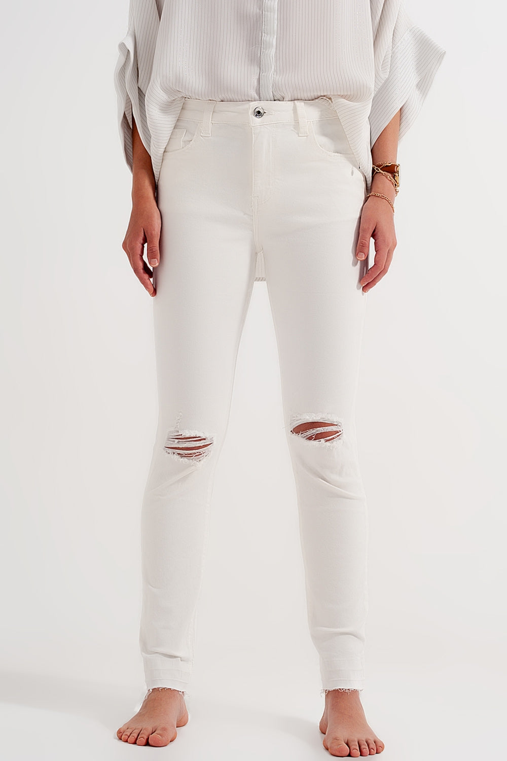 Ripped fray hem jeans in cream