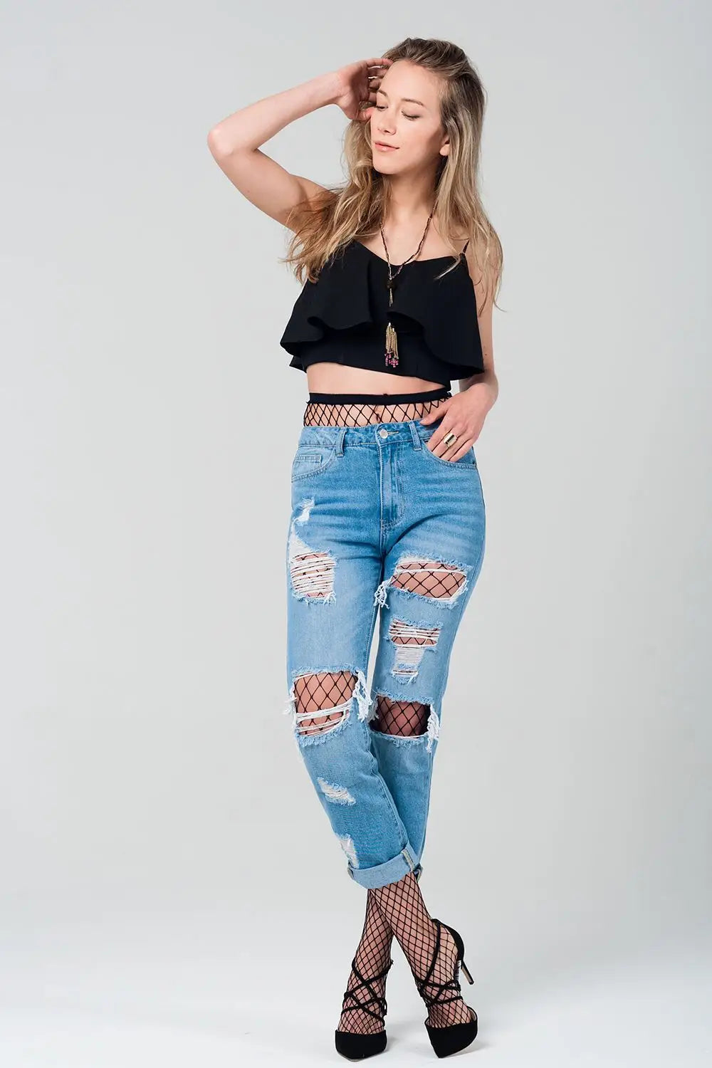 Ripped mom jeans with fishnet tights - Jeans