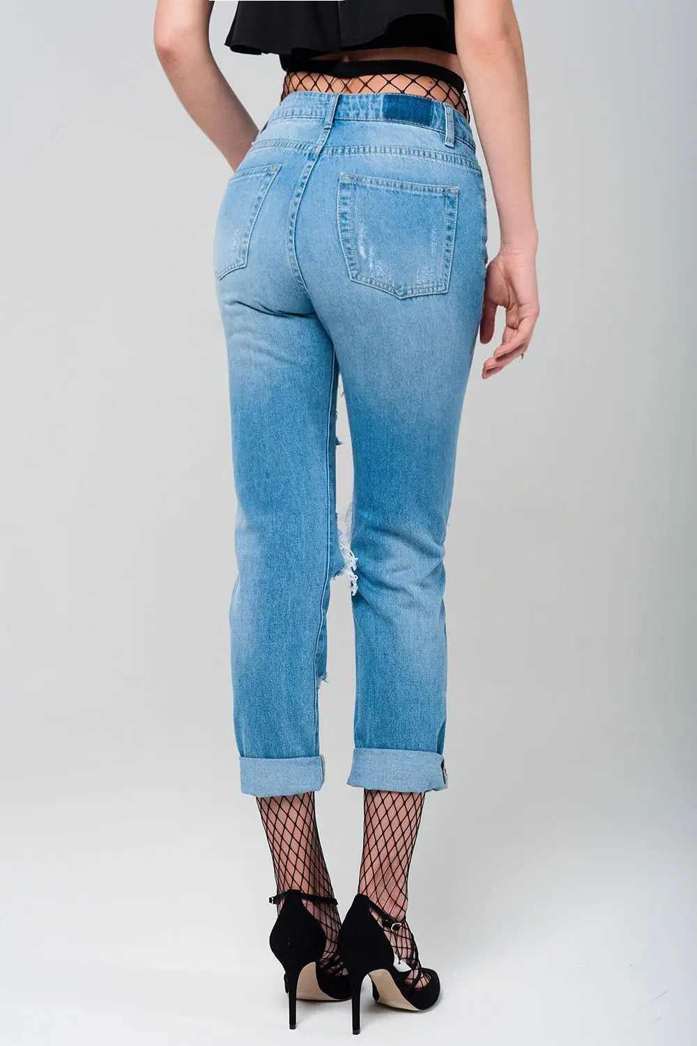 Ripped mom jeans with fishnet tights - Jeans
