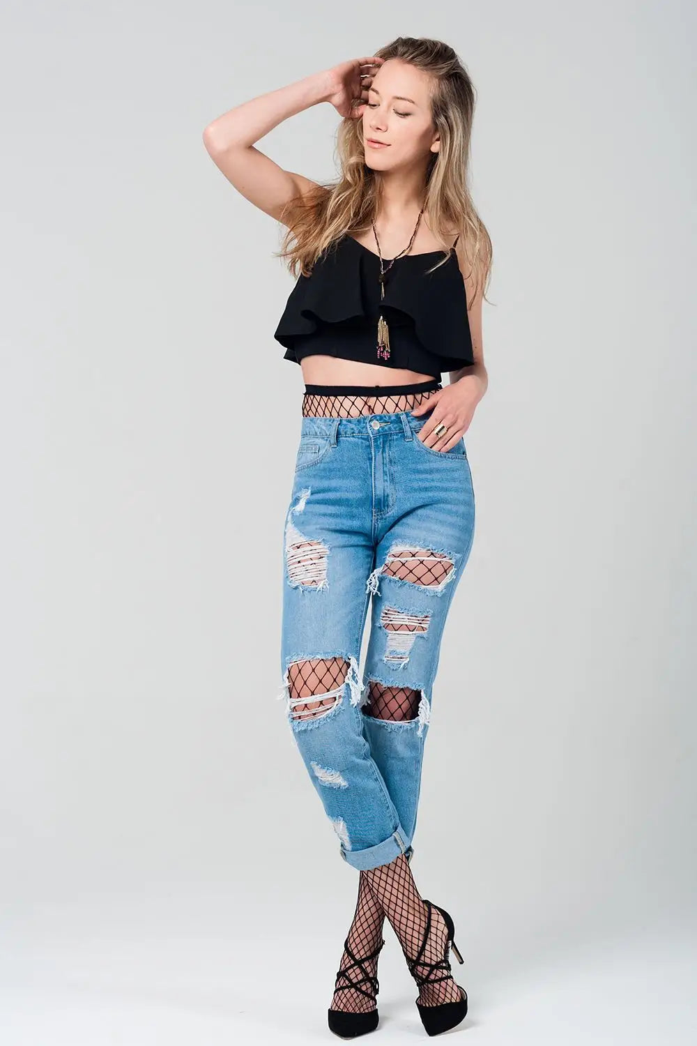 Ripped mom jeans with fishnet tights - Jeans
