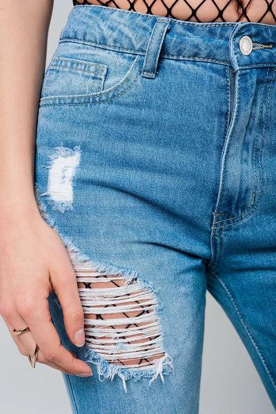 Ripped mom jeans with fishnet tights - Jeans
