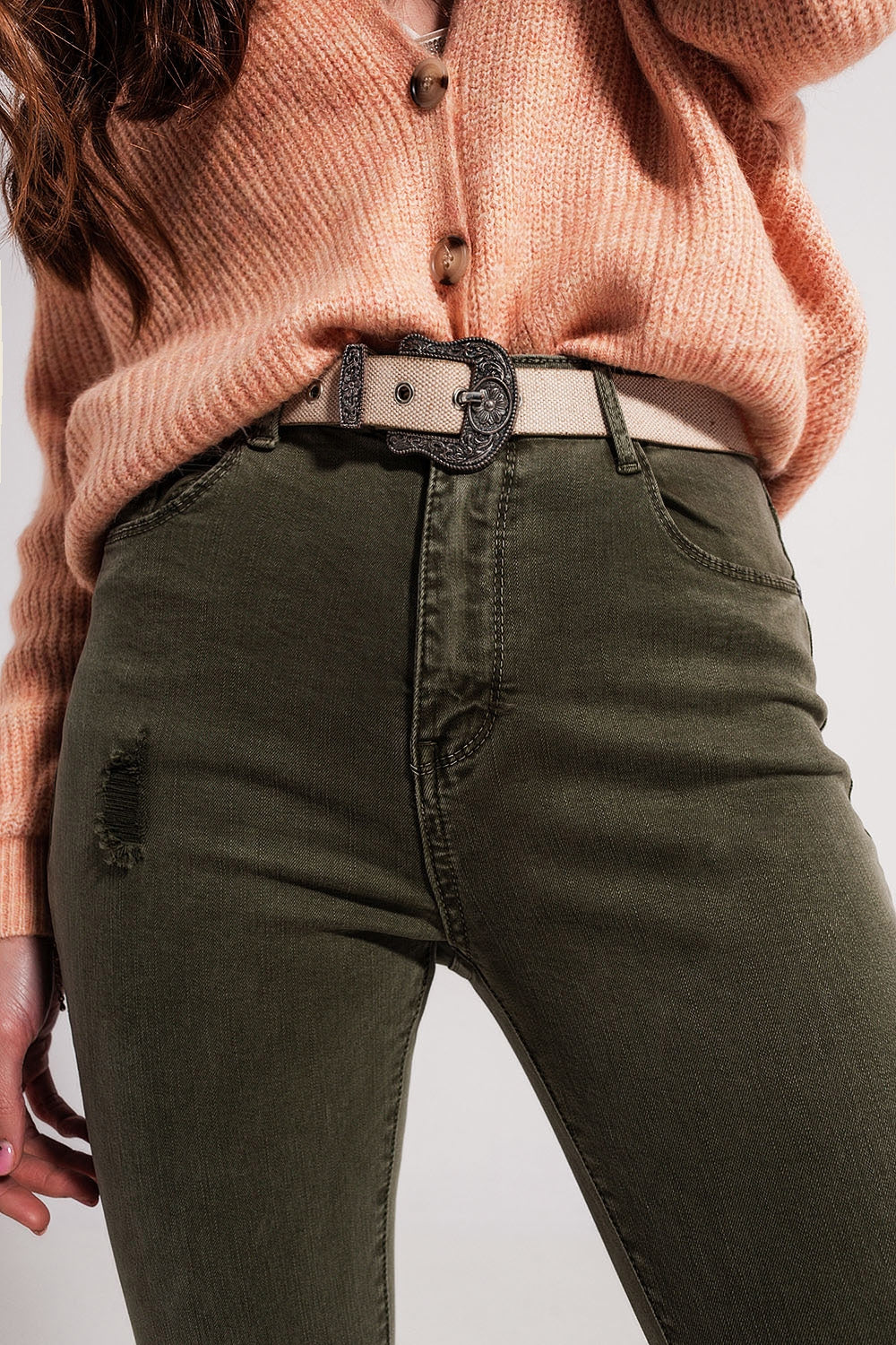 Ripped skinny jean in green