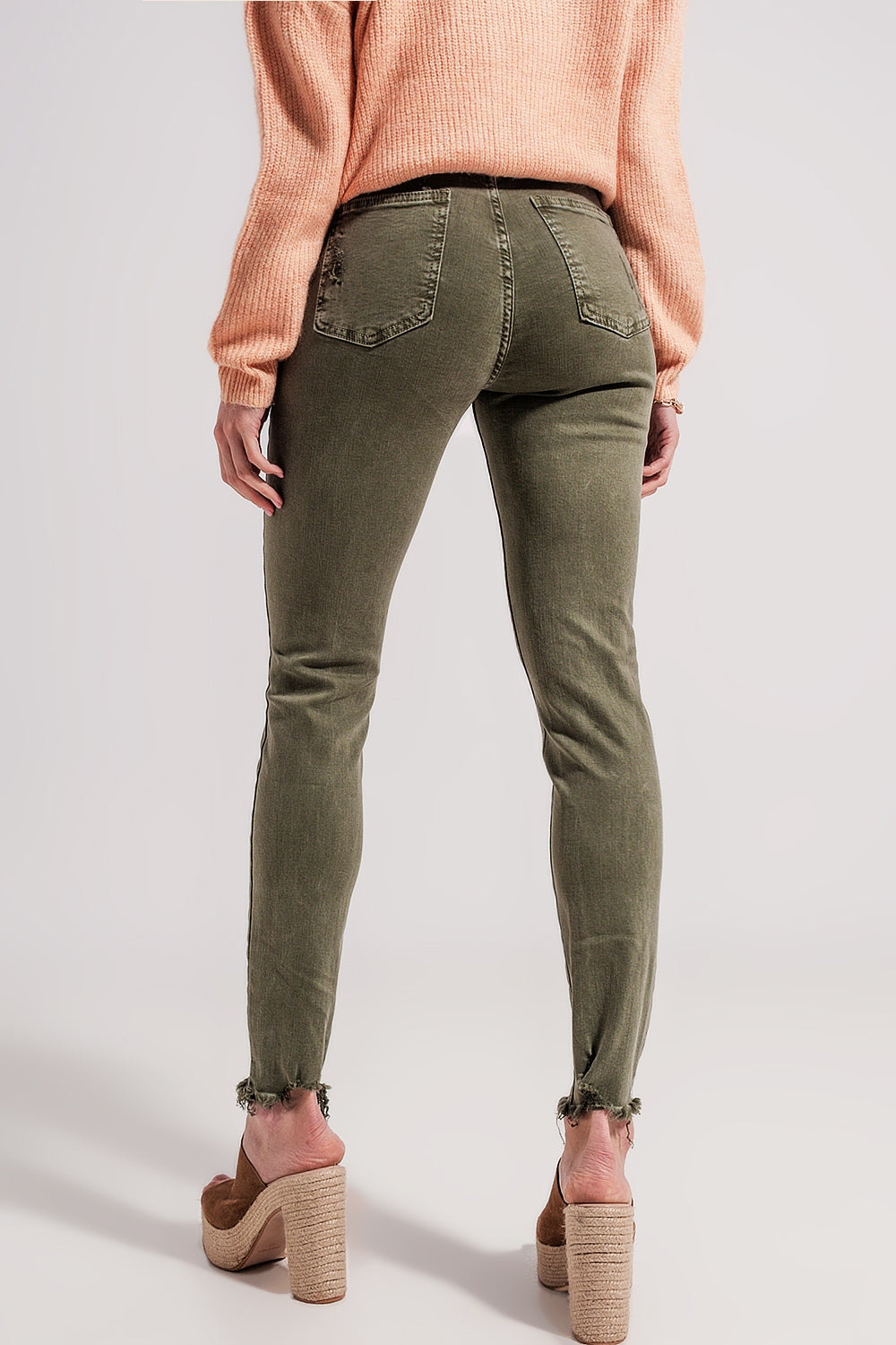 Ripped skinny jean in green