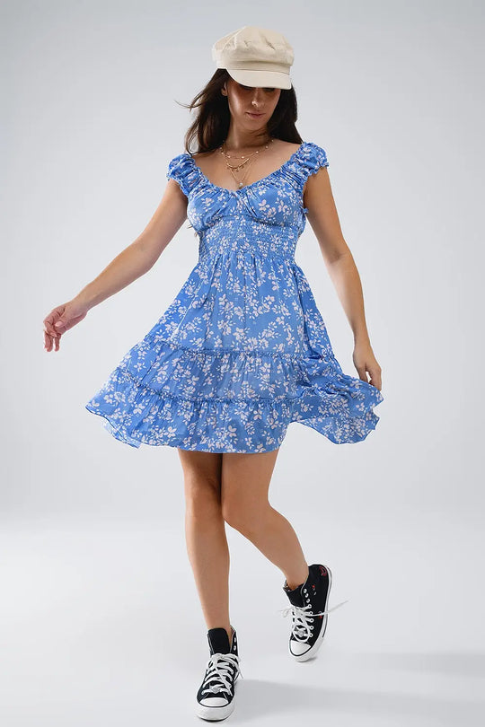 Q2 Robe courte bleue à imprimé floral blanc et taille élastique