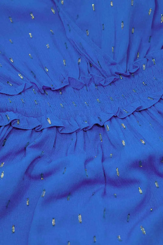 Robe mi-longue enveloppée bleue à taille smockée et à pois dorés - Vestidos