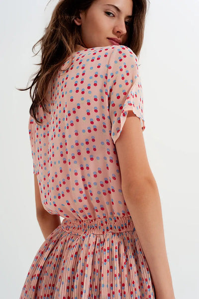Shirred mini dress with peplum in pink - Dresses
