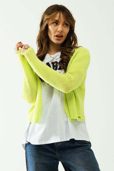 Short yellow knit cardigan with long sleeves