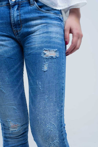 Skinny jeans in medium wash with rips