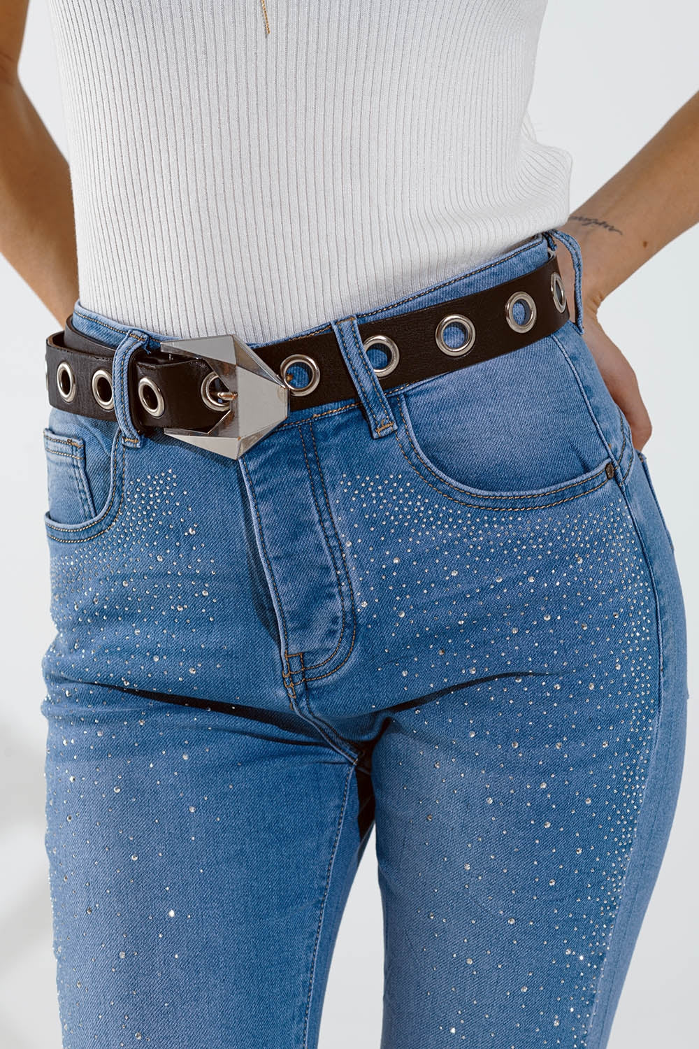 Skinny jeans in washed blue with strass all over the front