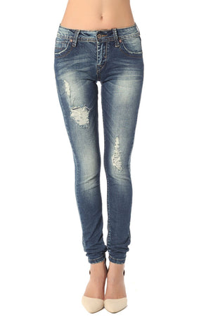 Q2 Skinny jeans with all over rips & distressing