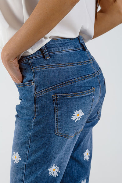 Skinny Jeans With Printed White Daisys In Mid Wash