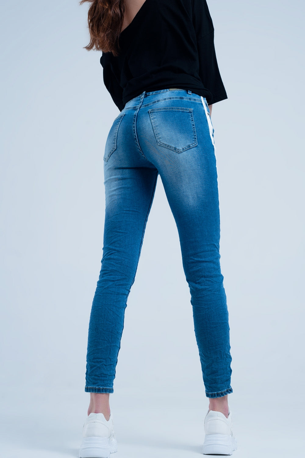 Skinny jeans with white side stripe