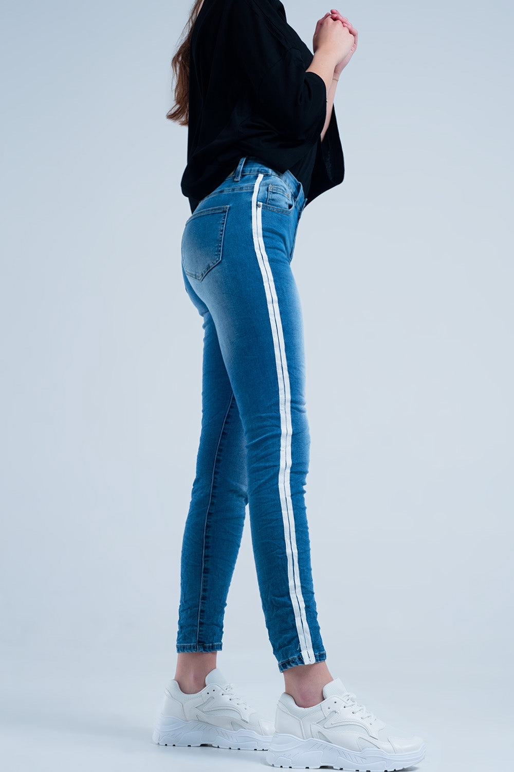 Skinny jeans with white side stripe