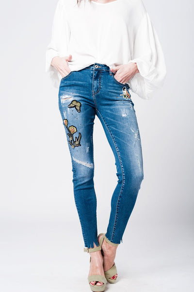 Q2 Skinny rip jeans with embroidered patches