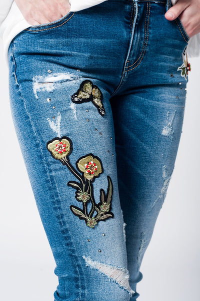 Skinny rip jeans with embroidered patches