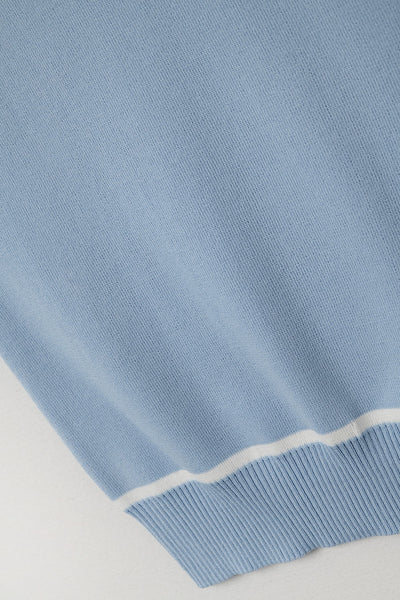 Sleeveless Sweater In Blue Featuring White Lines detail