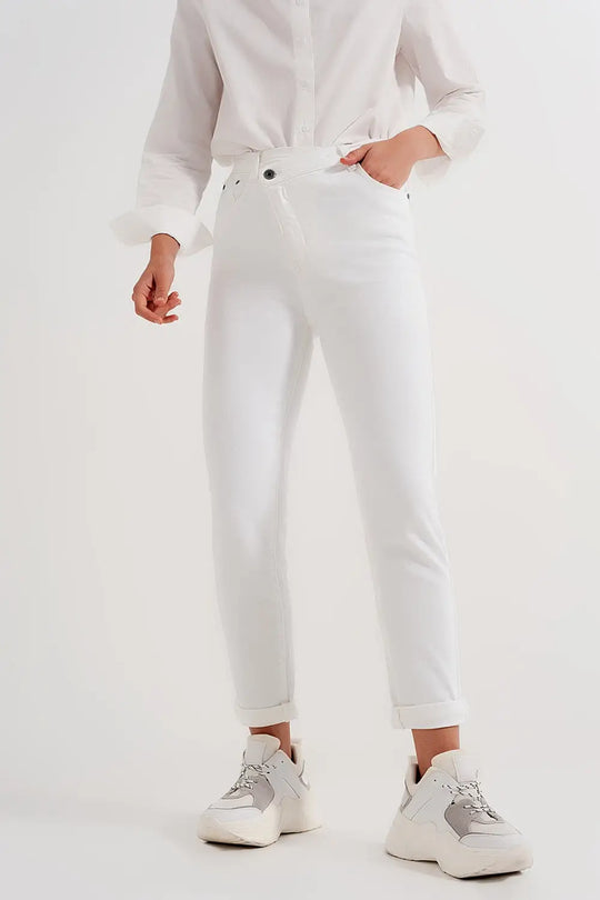 Slim jeans with asymmetric button in cream - Jeans