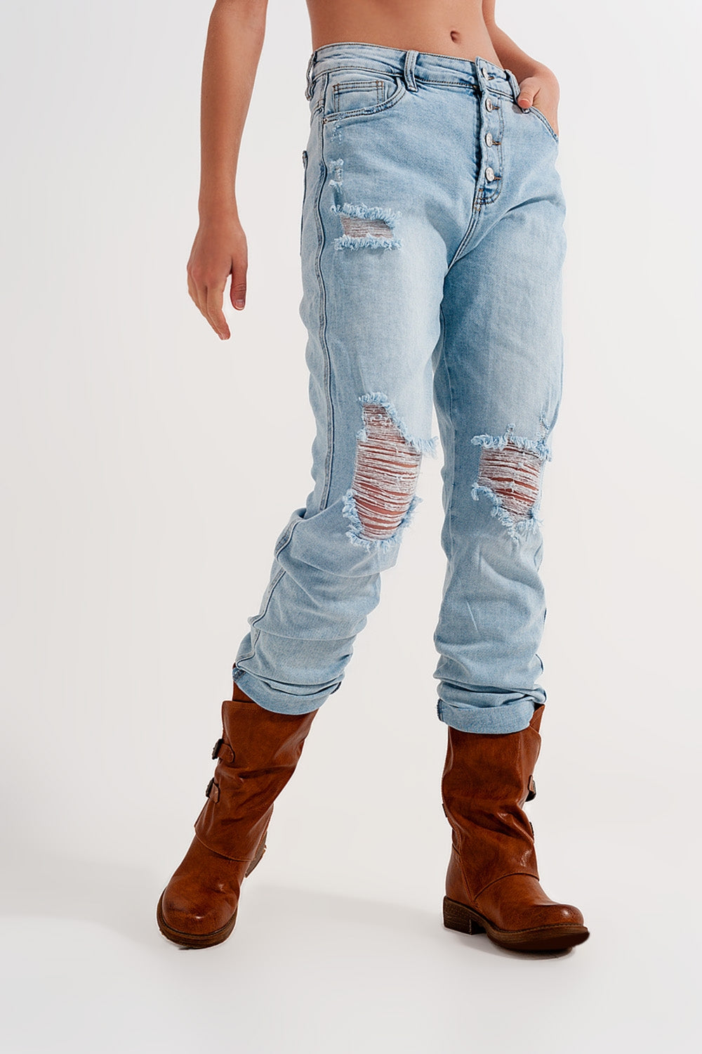 Straight leg distressed jeans with button detail in light blue