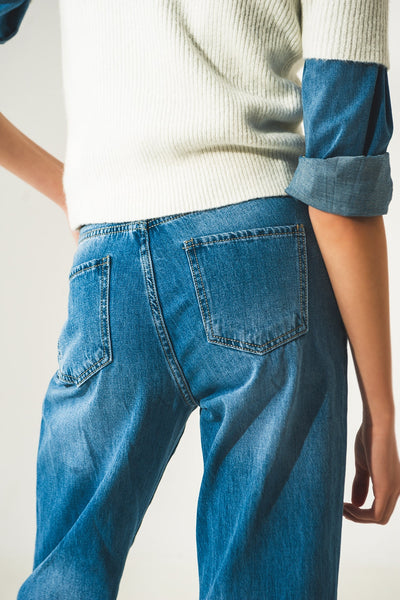 Straight leg jeans with darts at the waist in medium blue