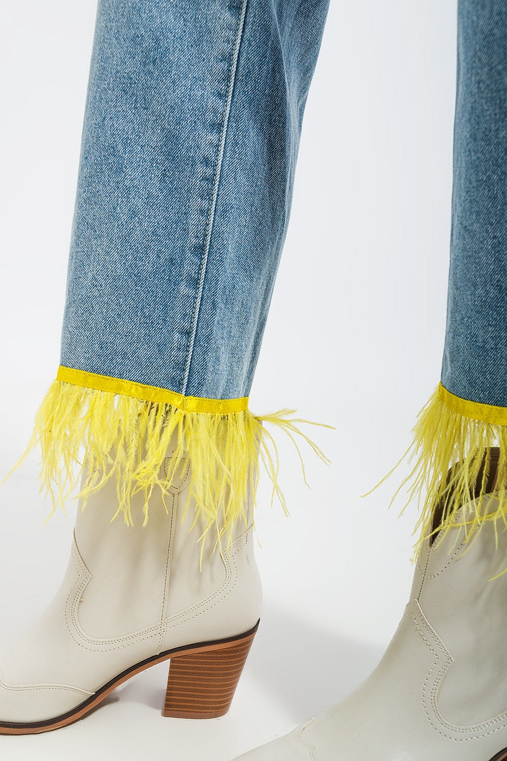 Straight leg jeans with yellow faux feather hem