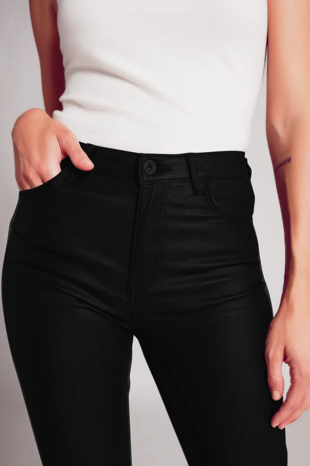 Stretch faux leather flare pants in black - Pants