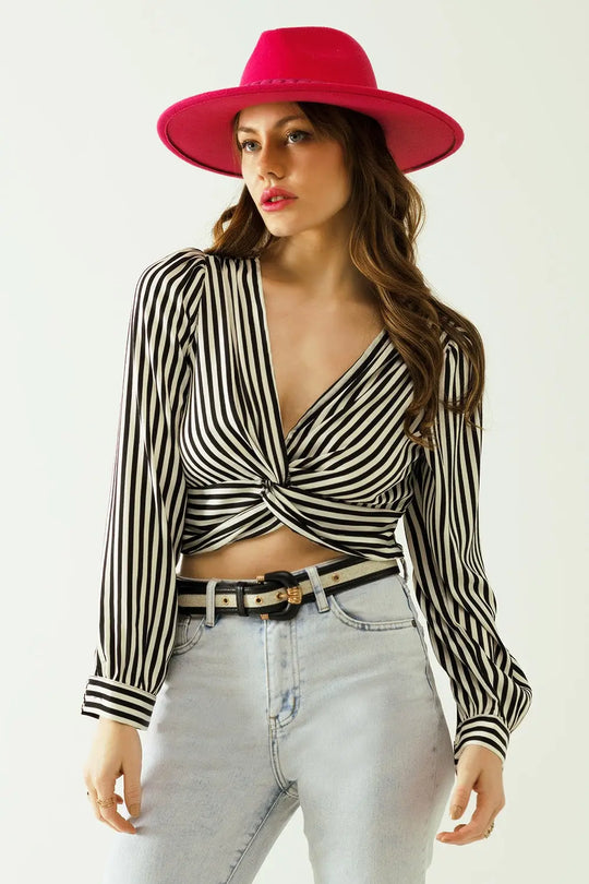 Q2 Striped crop top with V-neckline and twisted front in black and white.