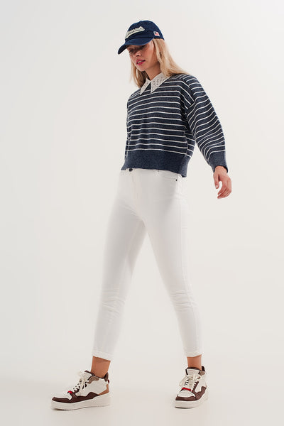 Striped knitted sweater with wrangler sleeves blue and white