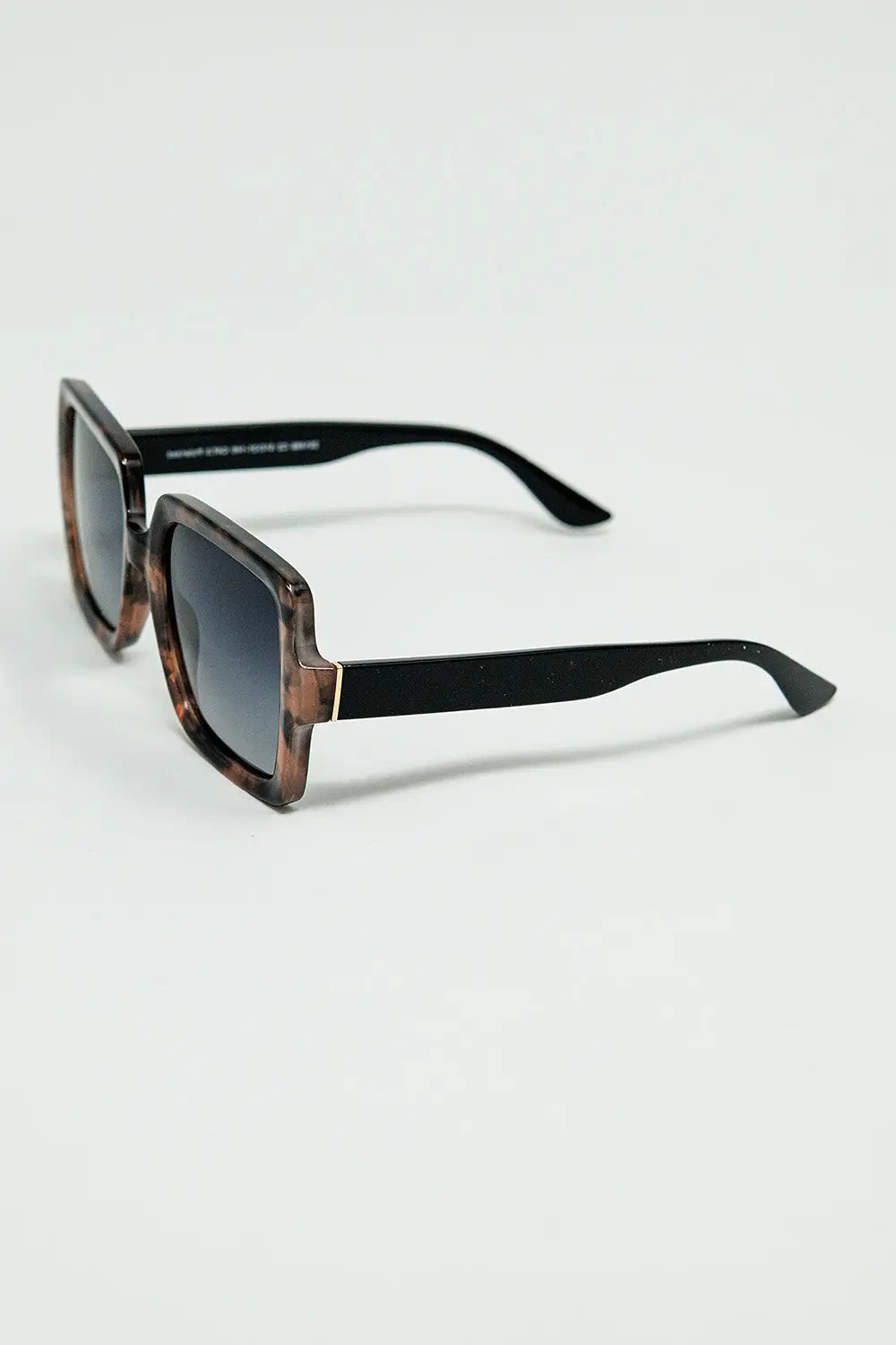 Sunglasses with a brown print frame and black temples - One Size / Brown
