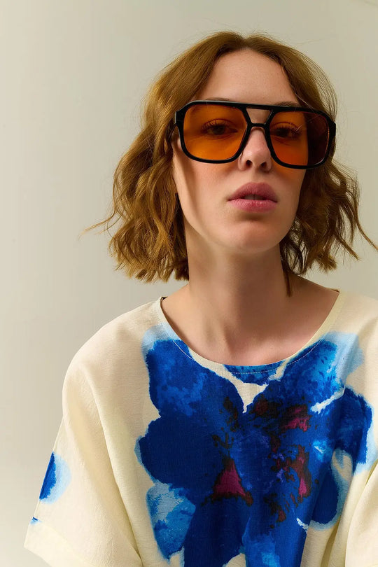 Sunglasses with black frames and orange lenses - One Size / Orange