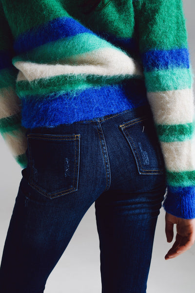Super skinny jeans with visible front buttoning in midwash