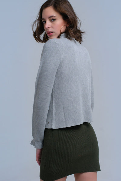 Sweater with ruffle in gray